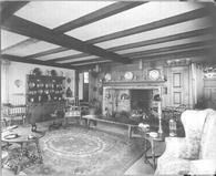 SA0518 - A room interior with fireplace, chairs, tables, metal ware, and sideboard., Winterthur Shaker Photograph and Post Card Collection 1851 to 1921c